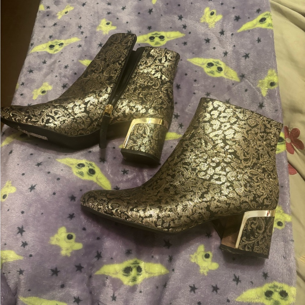 DKNY gold and black lame’ fabric ankle boots.